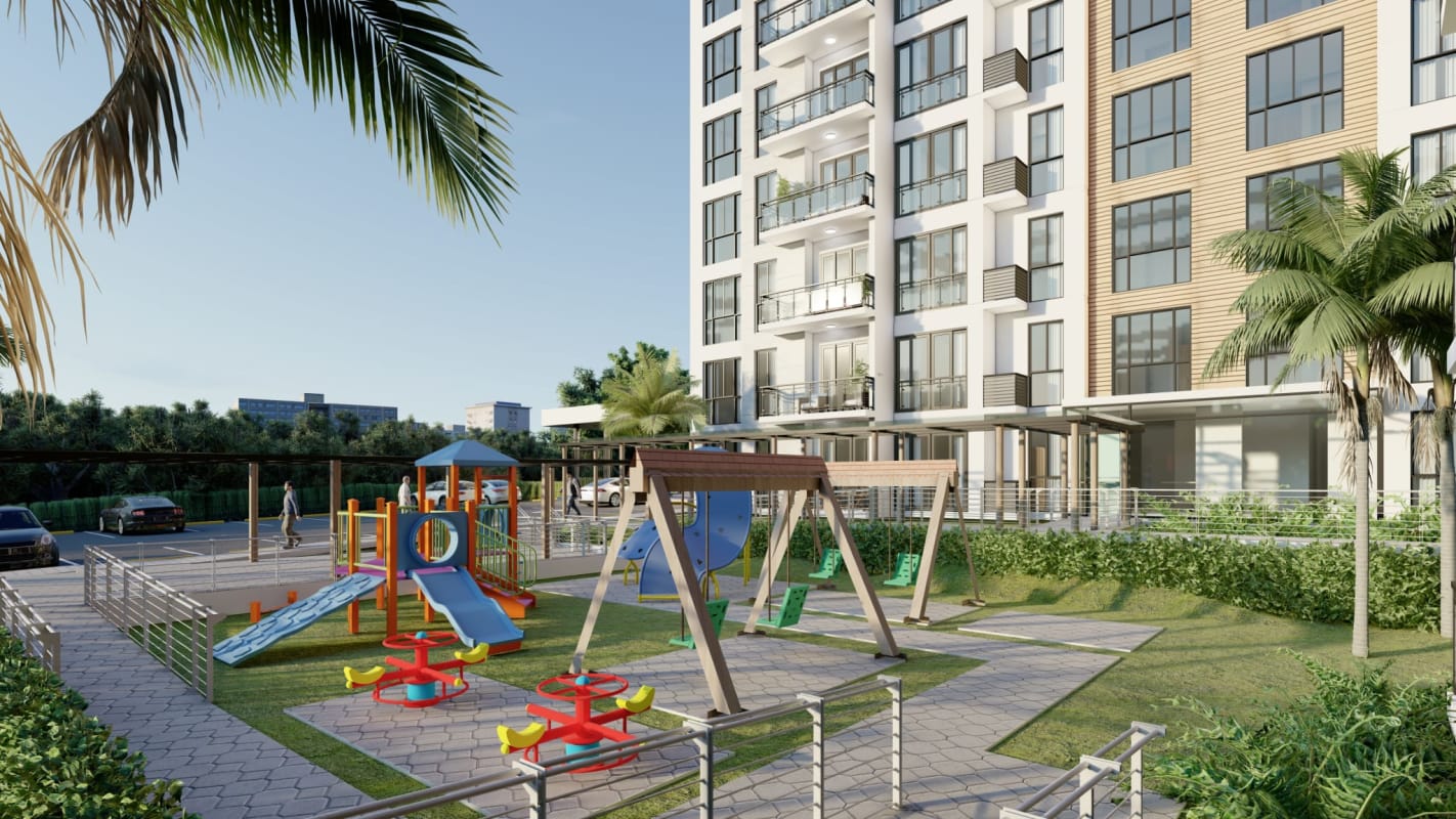 Children playground with slides swings lawns adjacent apartments PH Parque Las Acacias Panama