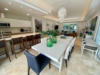 Modern kitchen and dining in penthouse with marble finishes Punta Arena Buenaventura