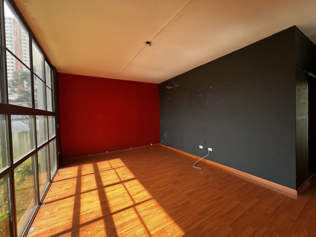 Bright living room with large windows and garden views luxury house Panama