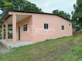 Interior room with tiled floor, peach walls, window, open space unfinished San Jose Panama