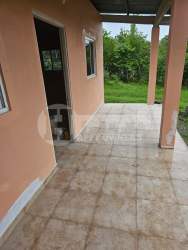 Patio covered tiled peach walls columns garden view San Jose Panama
