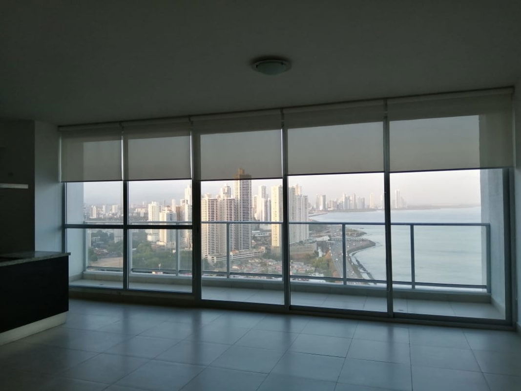Modern living room with floor-to-ceiling windows ocean view PH Ocean Club Punta Pacifica