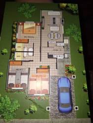 Outdoor community swimming pool with loungers in Puerto Caimito La Chorrera Gated Complex