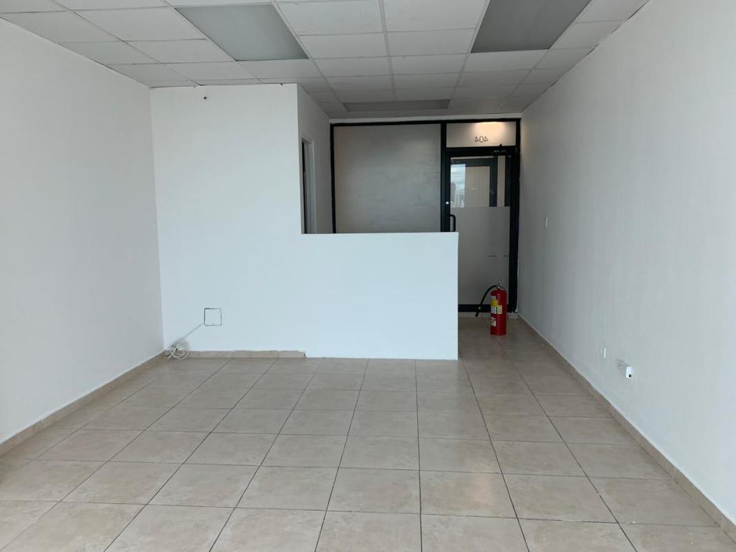 Empty office for lease with tiled floors drop ceiling partial wall divider in The Century Tower Panama