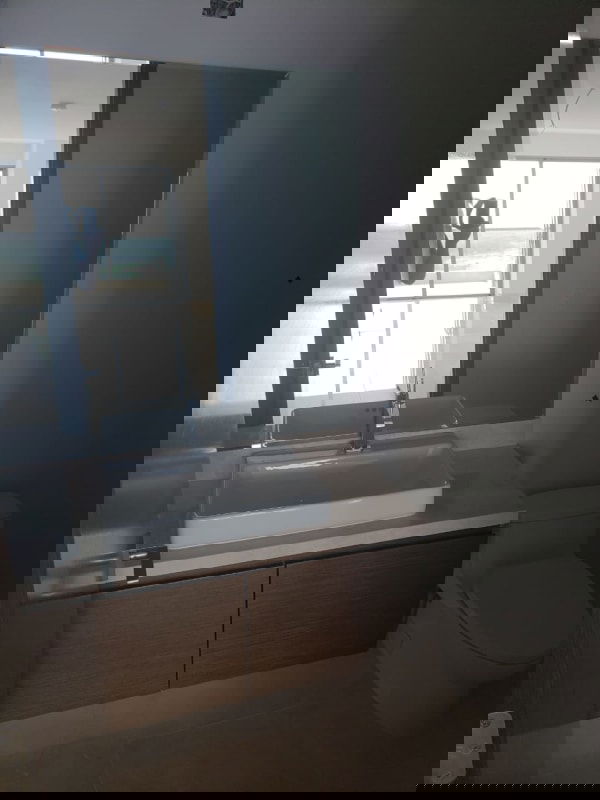 Luxury bathroom in The Reserve Santa María with marble tiles, glass shower, double sinks