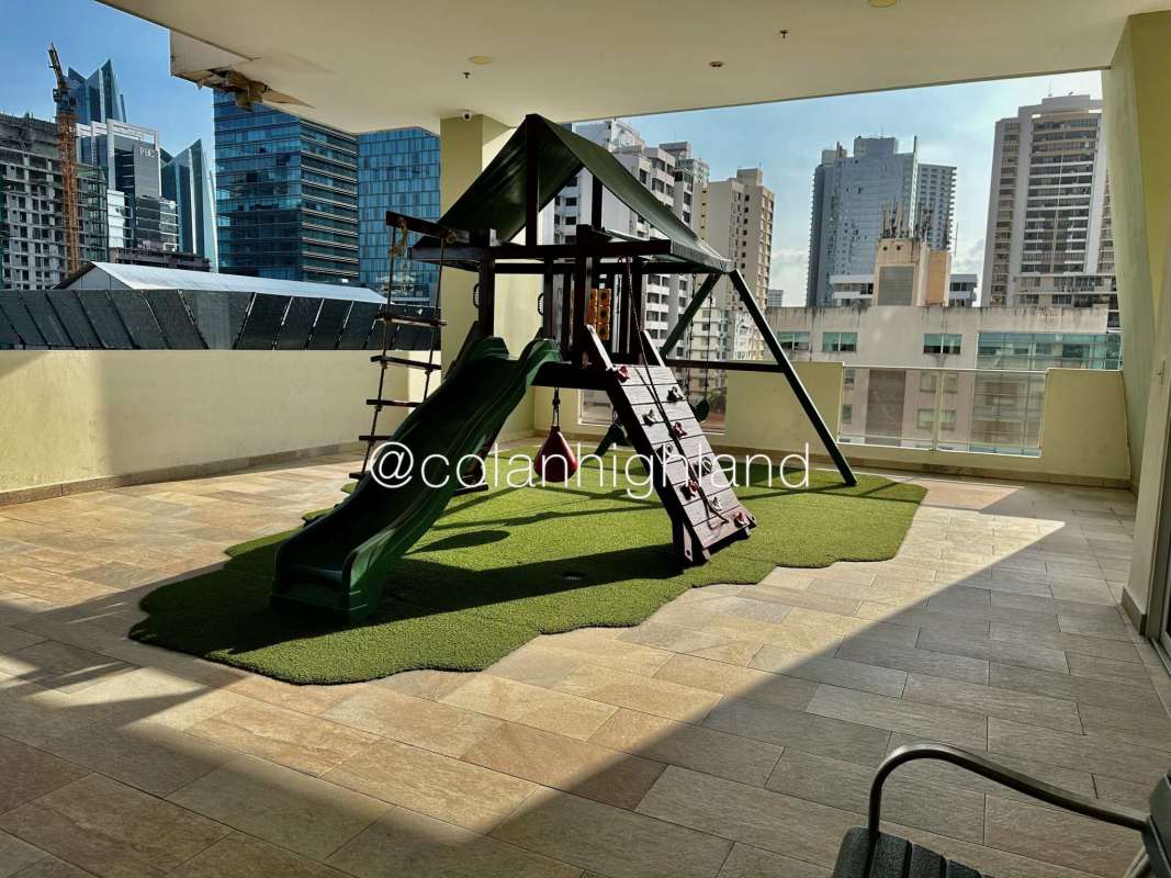 Playground terrace with kids play structure overlooking city Panama PH Miyaki