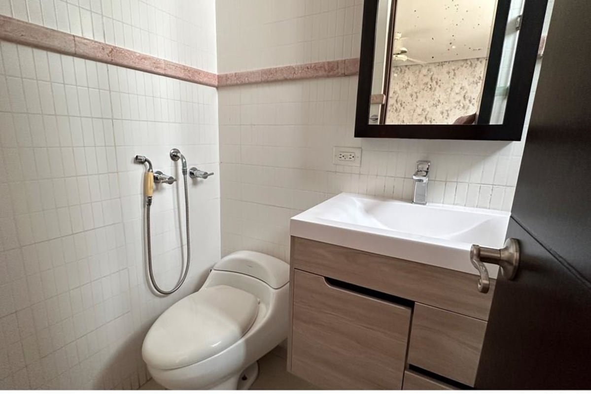 Spacious kitchen with granite countertops and modern appliances in PH Skyview Panama