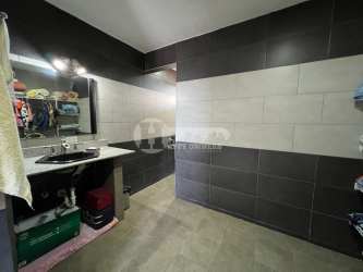 Bright living dining area with high ceilings tile floors large windows Via 4 Caminos Chitré