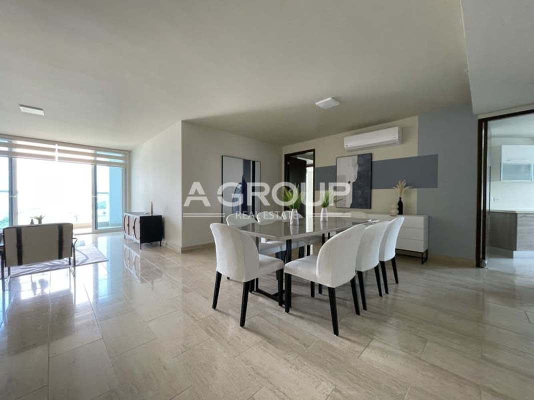 Contemporary kitchen with stainless steel appliances and large windows at The Regent Costa del Este Panama