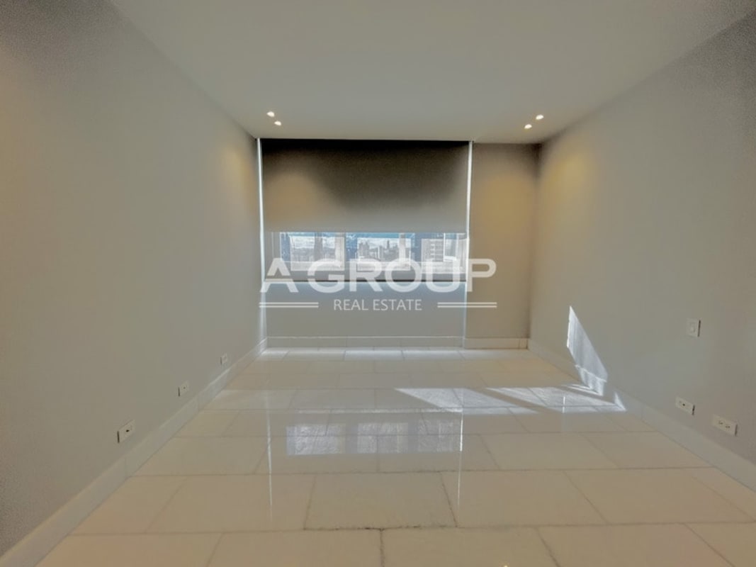 Luxury gym with boxing ring, full equipment, and mirror walls in The Towers Punta Paitilla Panama City