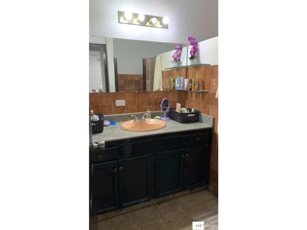 Traditional kitchen with granite countertops and cabinets in Panama house