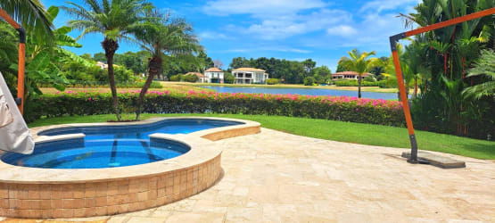 Modern living area with stylish decor open to dining at Marina Village Buenaventura