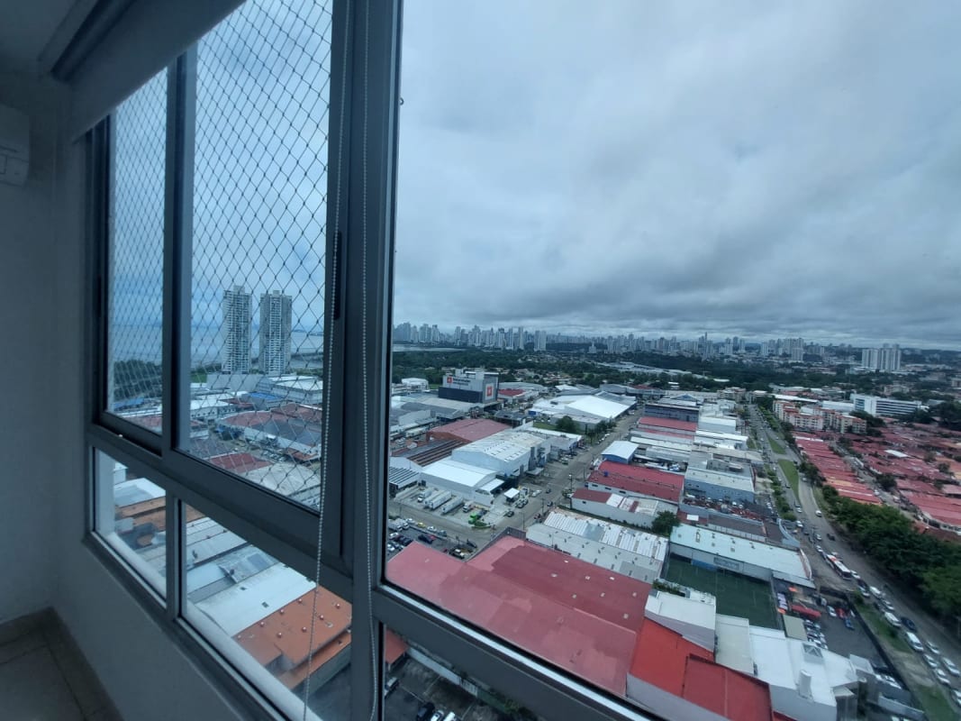 Bedroom with large window and panoramic skyline Costa del Este Panama apartment for rent
