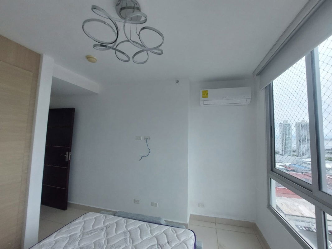 Bathroom with glass shower enclosure, vanity, tile wall Costa del Este apartment rental