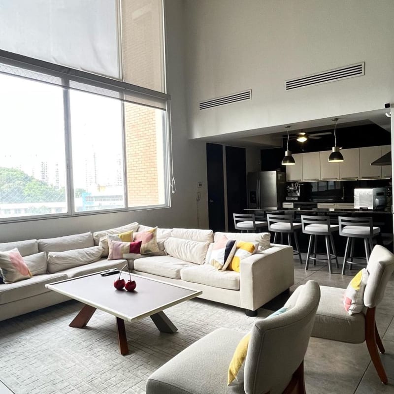 Renovated kitchen with granite countertops, appliances, cabinetry at PH Portanova El Cangrejo Panama