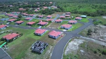 Unfinished house on large lot in San Carlos Panama within gated community