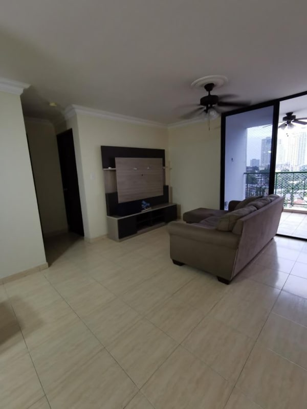Living room with sliding glass doors and tile floor in PH Sunset Park Panama
