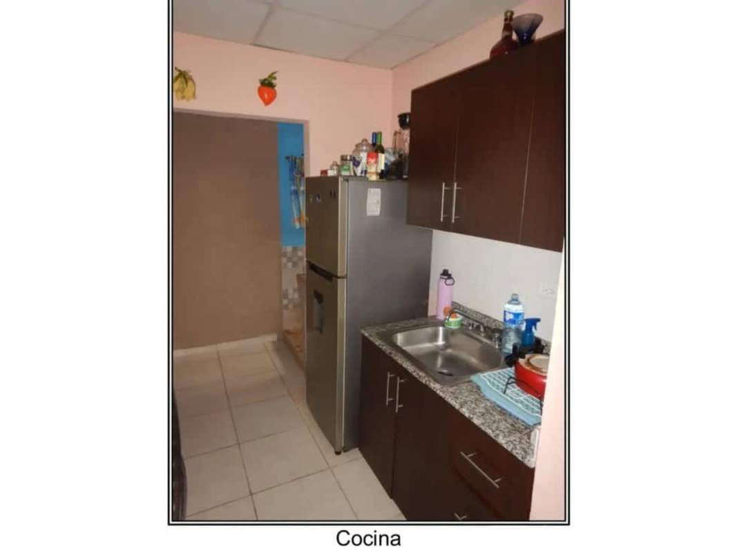 Living dining room with couches, TV, workspace in Viña del Mar home Panama