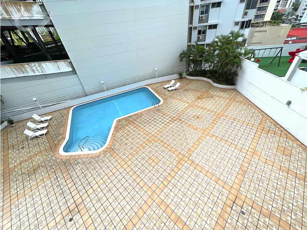 Bedroom with large window, walk-in closet, attached bathroom in PH Sol Marina Marbella Panama