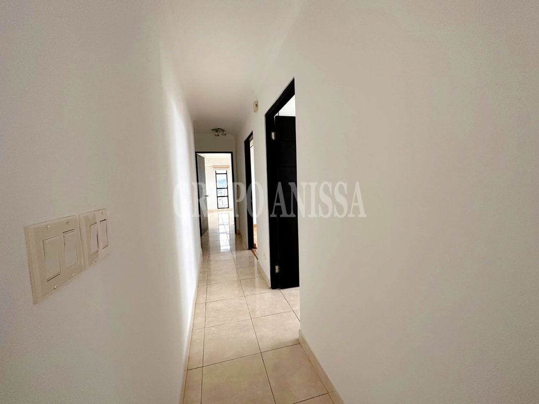 Modern lobby entrance with seating area at PH Dos Mares Tower Panama