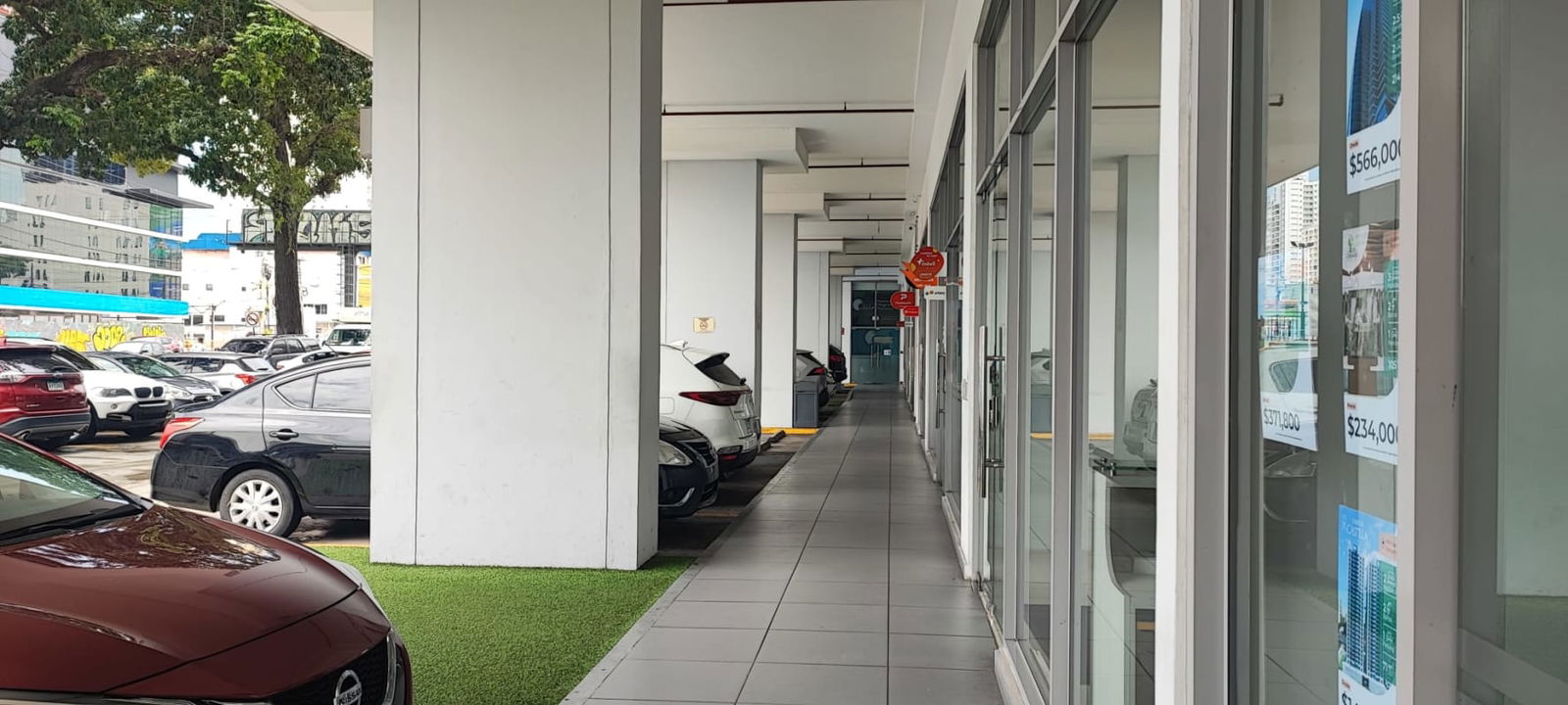 Exterior sidewalk and commercial entrances of Plaza Valencia Via España Panama City