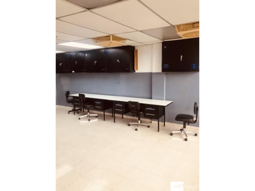Laboratory space with counters cabinets and chairs El Dorado Plaza Colonial Panama