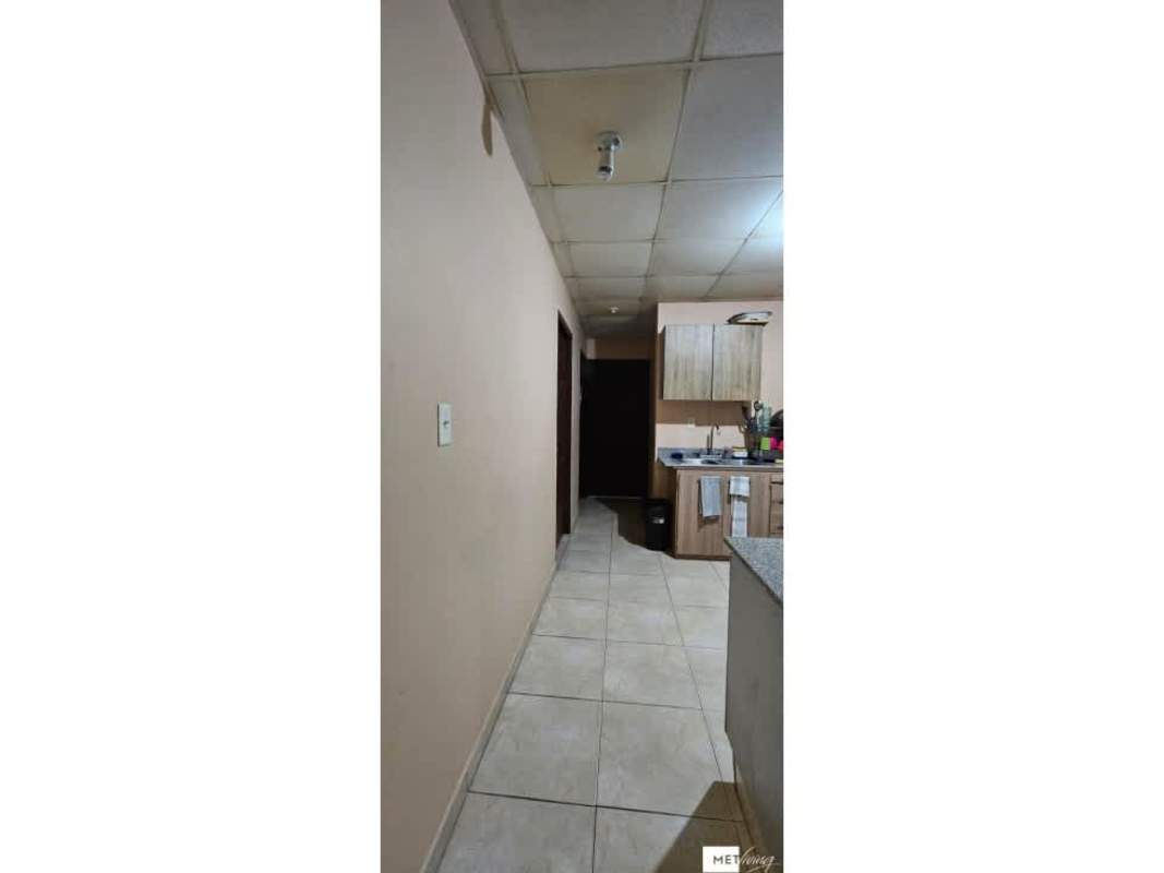 Bedroom with built-in closet and tile floors in rental house Villas del Bosque Pedregal