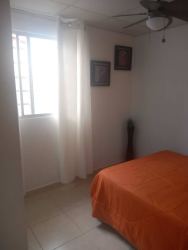Affordable room rental with bed, fan, bright light in Residential Arboledas La Chorrera