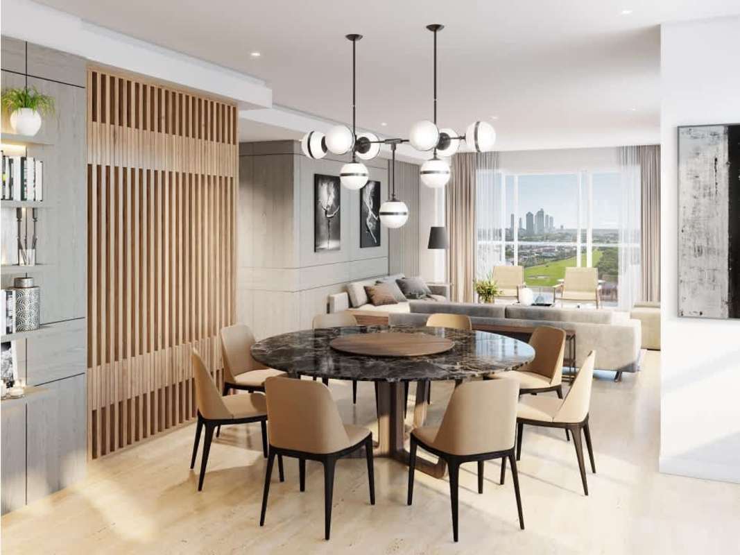 Spacious living and dining area with panoramic windows and golf course views at Celeste Santa Maria Panama