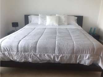 Spacious master bedroom with AC, walk-in closet, large windows at Playa Blanca Resort Panama