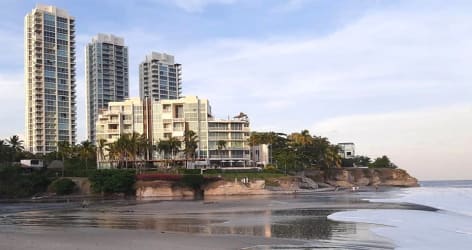 Spacious balcony with table chairs glass railing panoramic Pacific view at PH Rio Mar San Carlos Panama