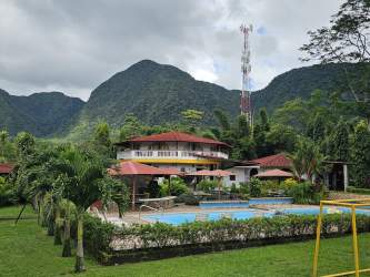 Outdoor pools surrounded by lush gardens and mountains in luxury hotel Panama