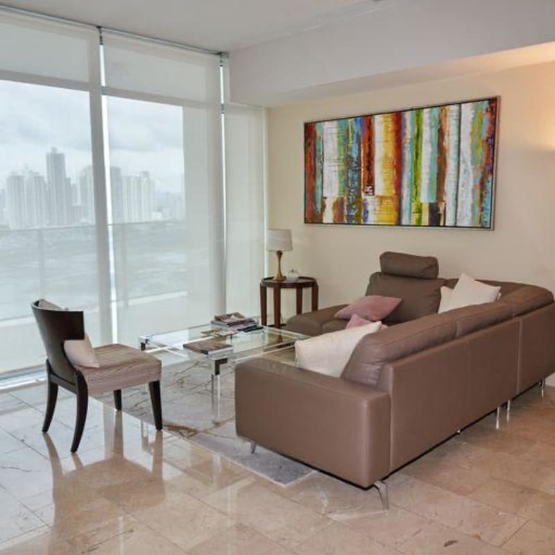 Master bedroom with balcony ocean and skyline view PH Grand Tower Panama City