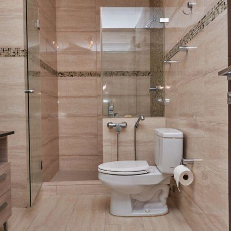 Spacious modern living room with large windows ocean skyline view in PH Grand Tower Panama City