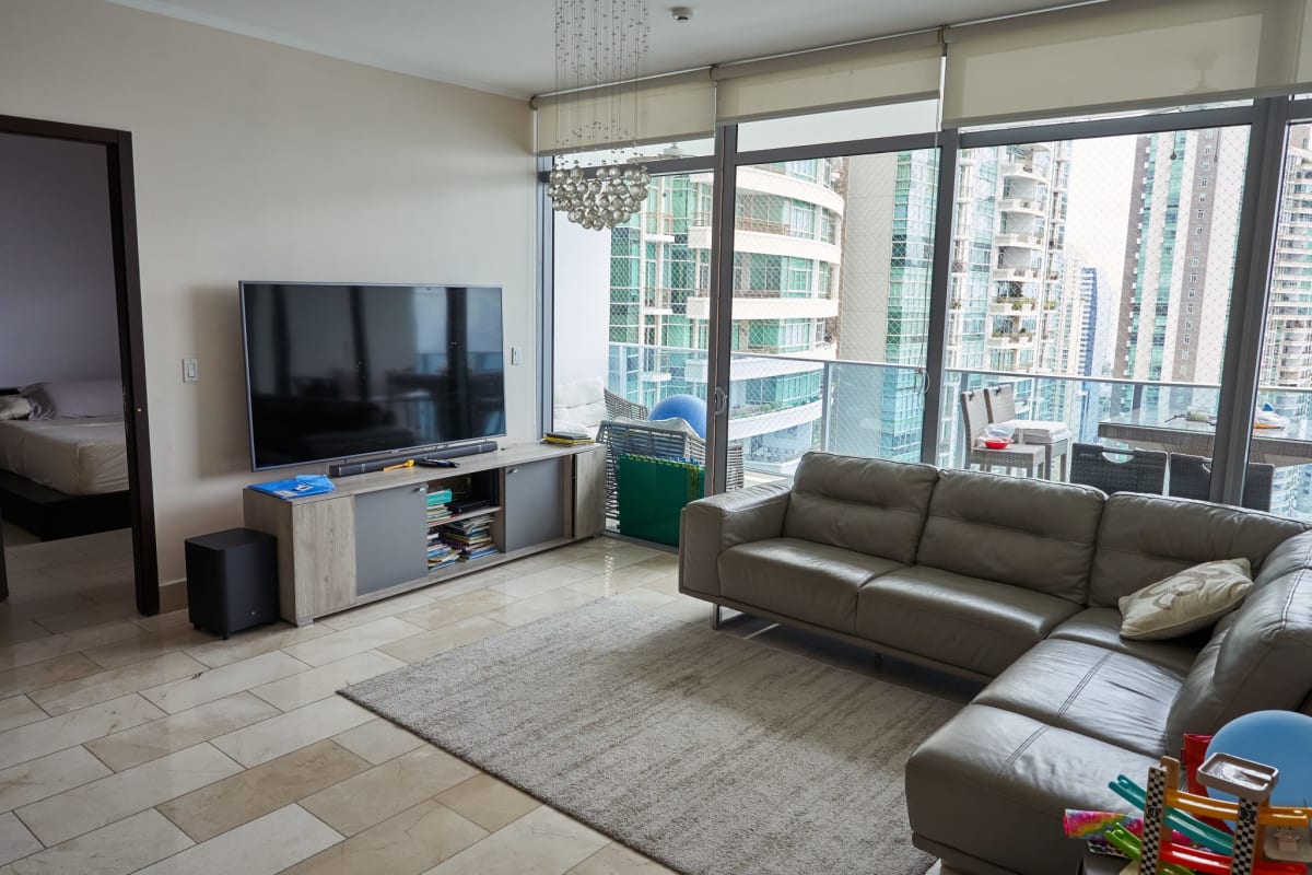 Kitchen equipped with granite countertops and stainless steel appliances at Grand Tower Panama