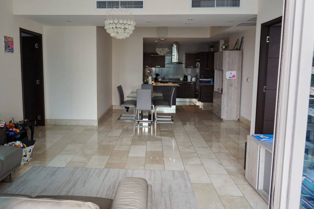 Bathroom with glass enclosed shower, mosaic tile detail at Grand Tower Punta Pacifica Panama