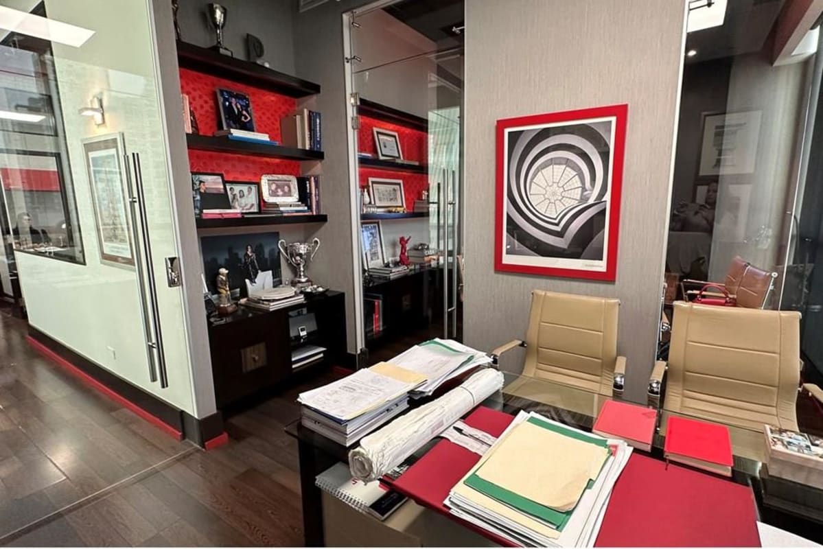 Bright office space with wood floors, glass partitions, and panoramic windows at PH Blue Business Center San Francisco Panama