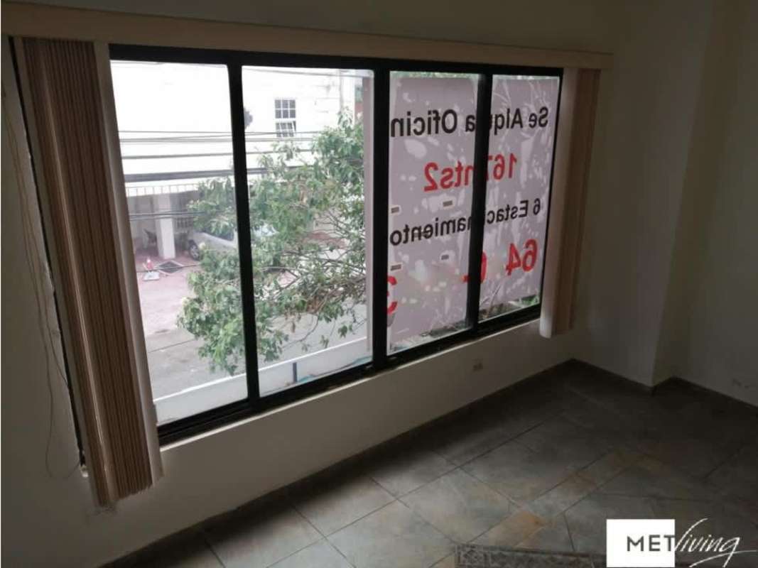 Office space with large windows natural light tiled floor PH Metric San Francisco Panama