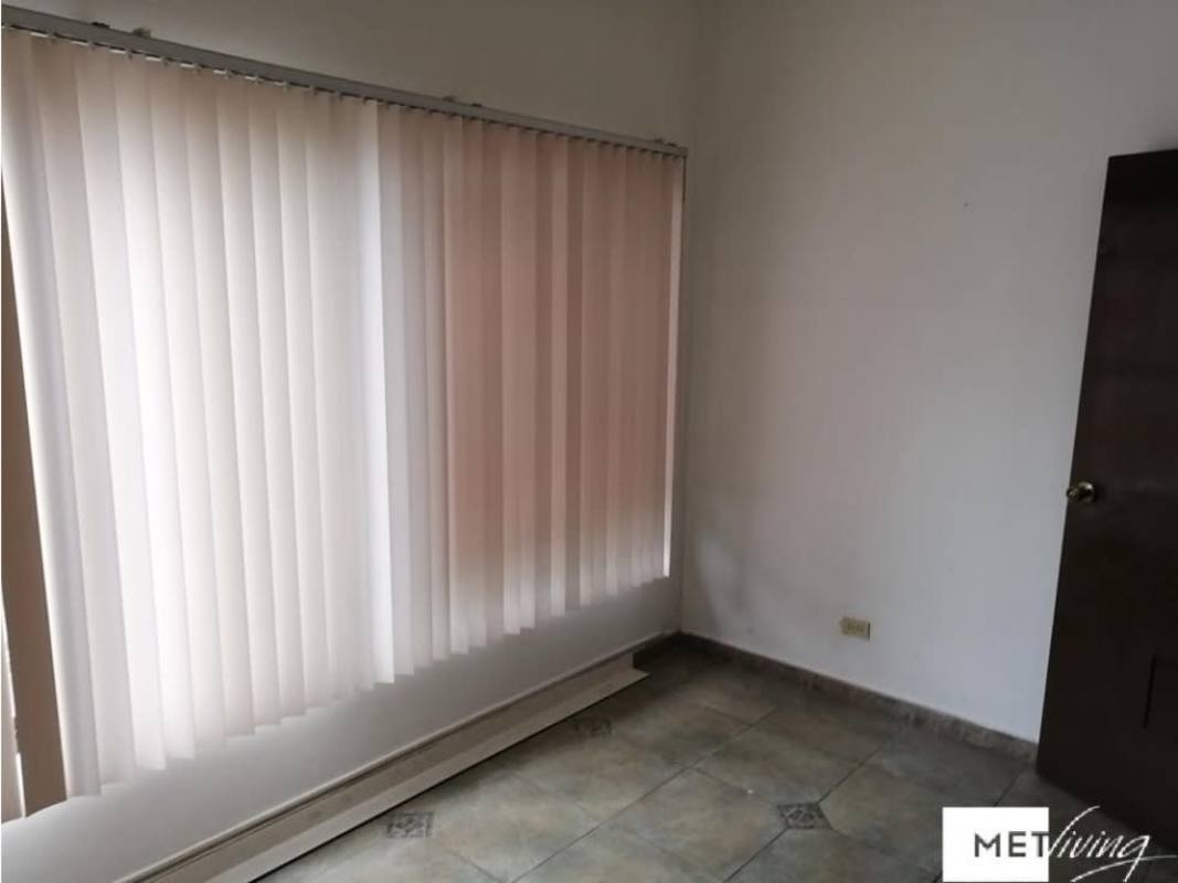 Empty minimalist office with window blinds tile floors PH Metric San Francisco Panama