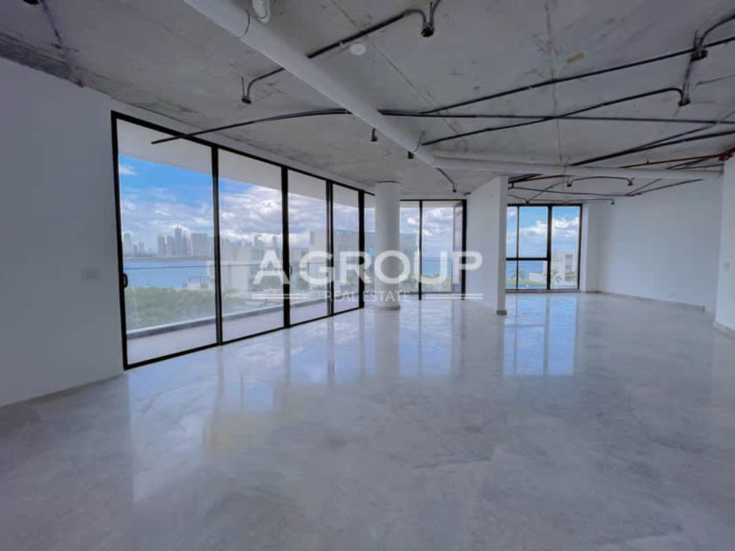 Open concept loft with skyline waterfront views glass walls Ocean Reef Islands Punta Pacifica