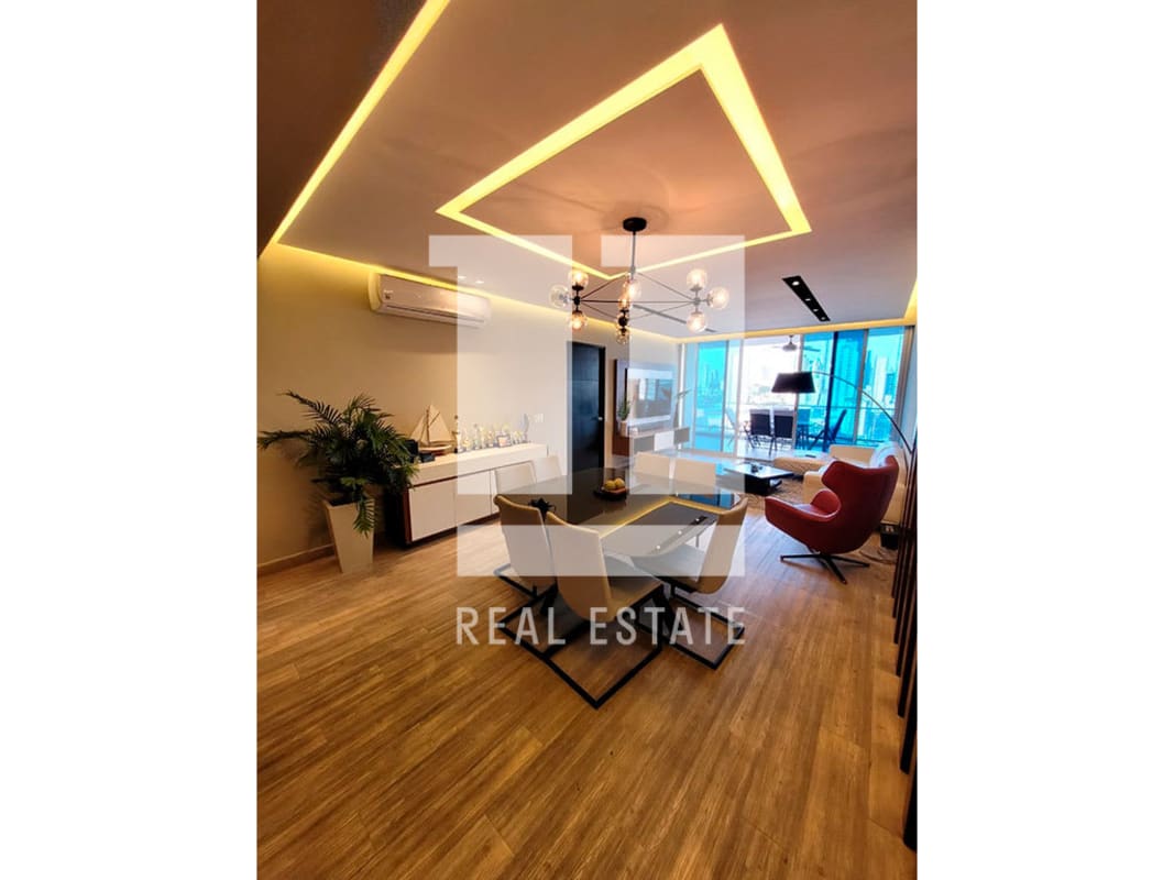 Spacious oceanview living and dining with floor-to-ceiling windows at PH Destiny Avenida Balboa