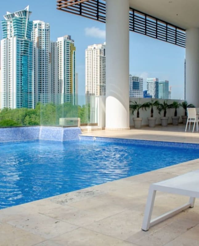 Contemporary bedroom with city view, blackout blinds, AC at PH Park Lane Costa del Este Panama