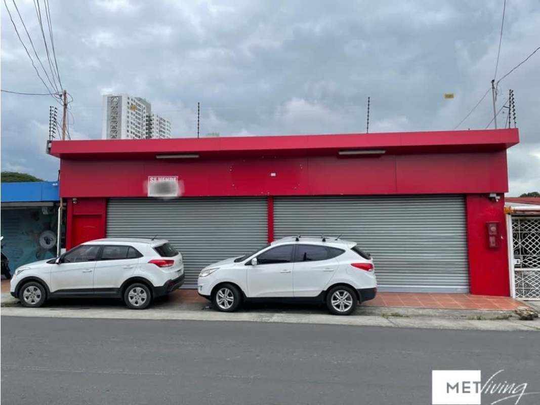 Spacious tiled commercial interior with drop ceiling in Panama City
