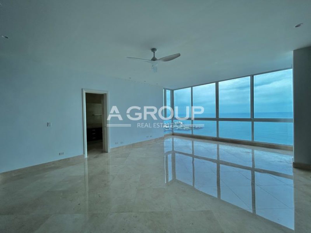 Bedroom with black accent wall marble tile large windows Punta Paitilla luxury rental