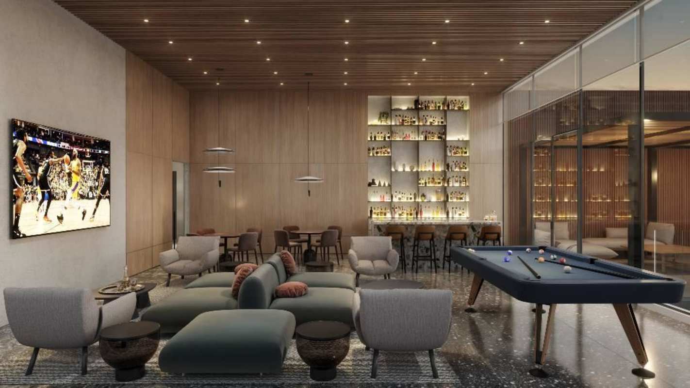Modern entertainment lounge with bar and pool table amenities KYTE Tower