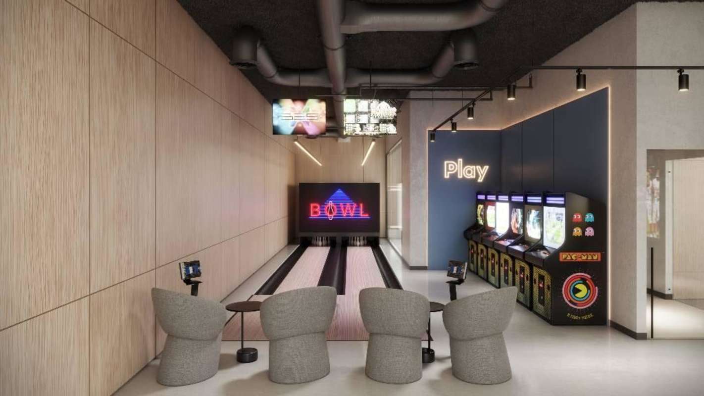Private bowling lanes and arcade game lounge luxury amenities KYTE Tower Panama City