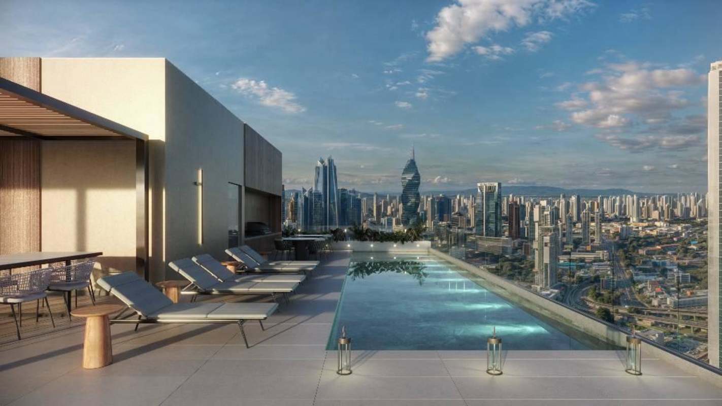 Modern rooftop infinity pool with skyline views at sunset KYTE Tower Panama