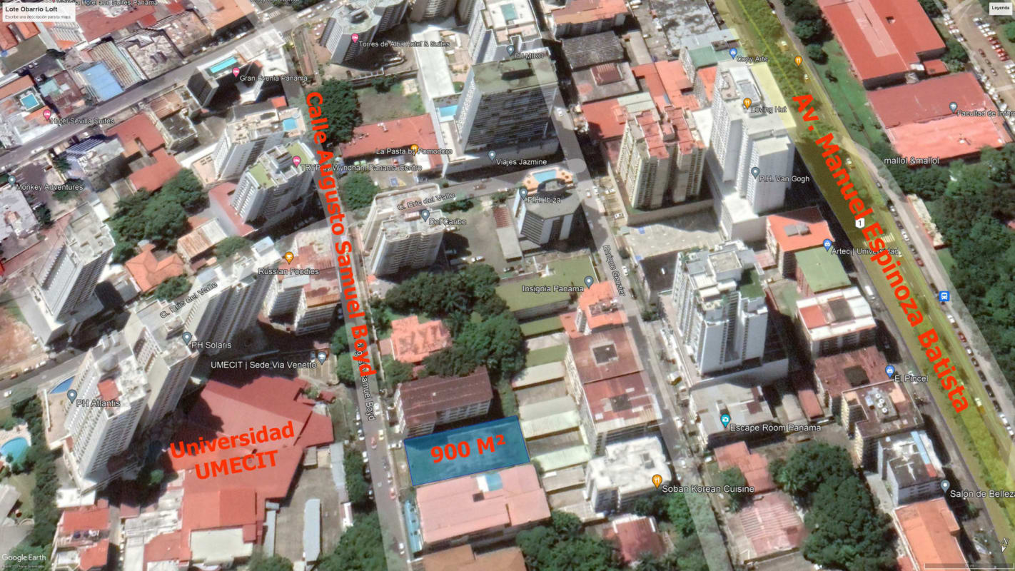 Urban corner lot with boundary walls and adjacent apartment buildings in Panama City