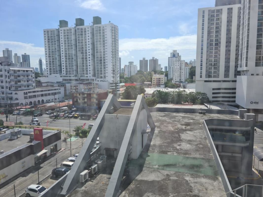 Outdoor covered patio with bar counter, dining, plants PH Brisas de San Fernando Panama City