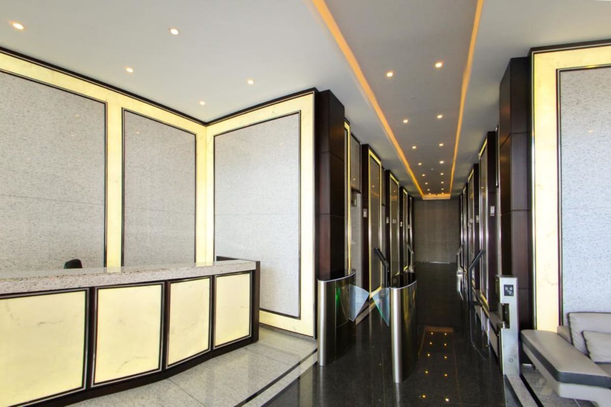 Office lobby with reception desk and security turnstiles modern design PH Golden Point Panama